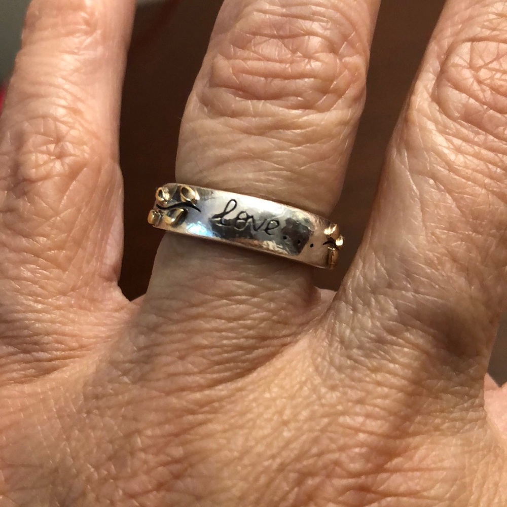 Sterling silver .925 with 14k gold leaves. LOVE band